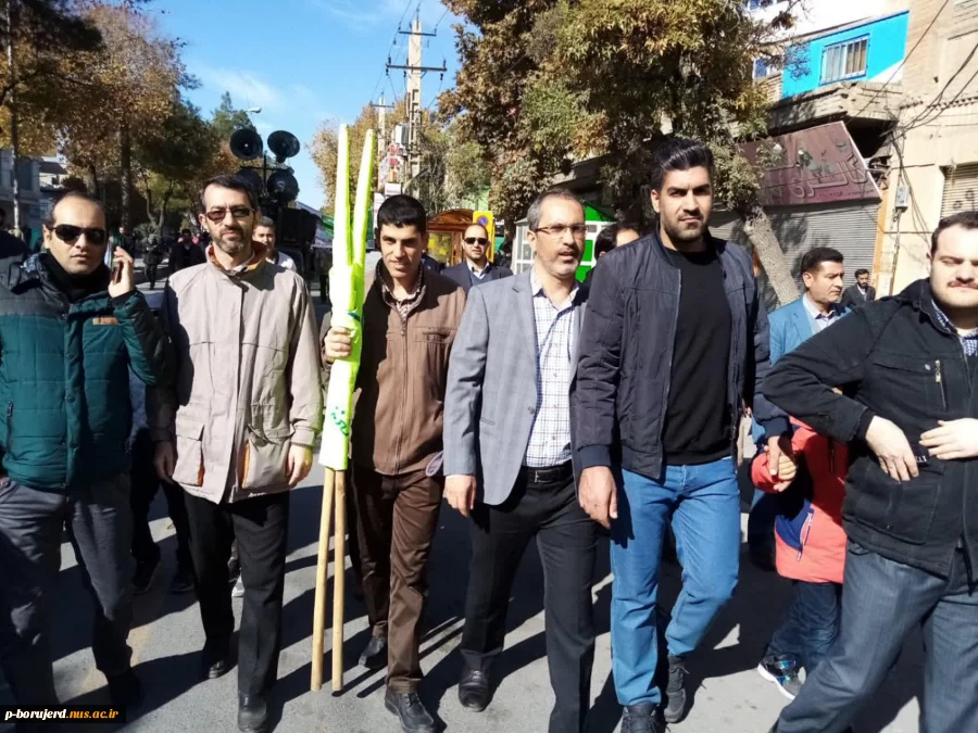 راهپیمایی باشکوه رئیس،کارکنان،اساتید و دانشجویان آموزشکده فنی پسرا ن بروجرد در حمایت از اقتدار و امنیت کشور و محکومیت اقدامات آشوبگرانه اشرار و بدخواهان نظام مقدس جمهوری اسلامی ایران 5